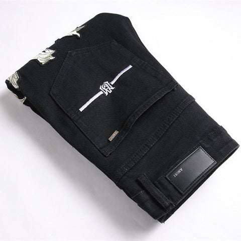 Amiri Jeans Ripped Stretch Jeans
